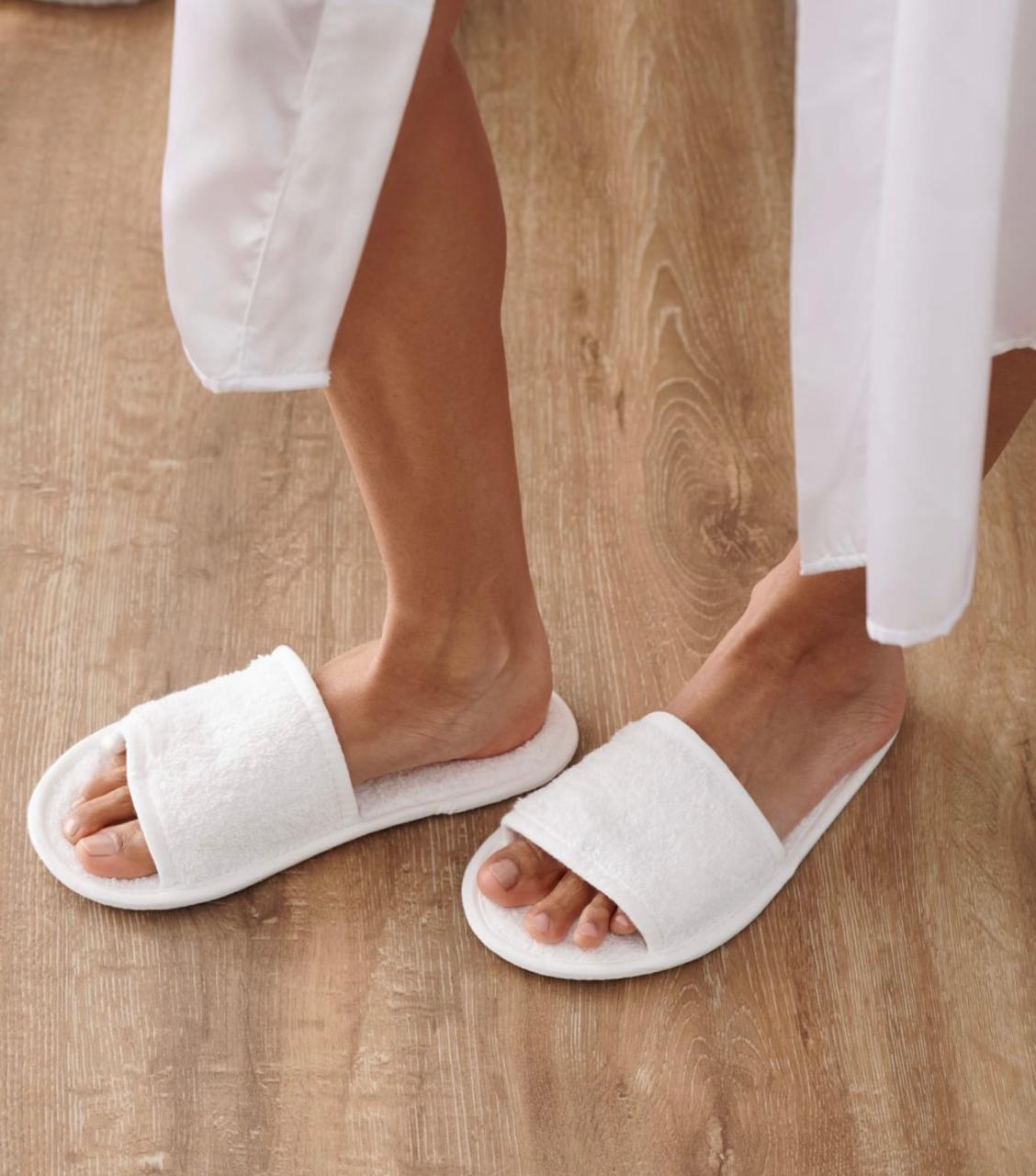 White hotel slippers